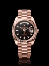 Rolex Day-Date 40mm Eisenkiesel Baguette Diamond Dial Everose Gold President 228235 – New 2026